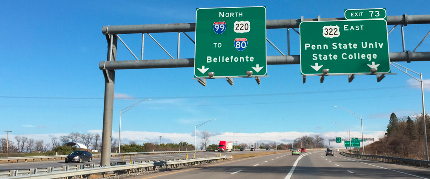 highway signs on the drive into State College