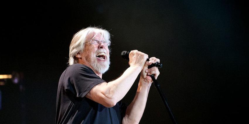 Bob Seger sings into microphone during his performance at the Bryce Jordan Center in 2013.