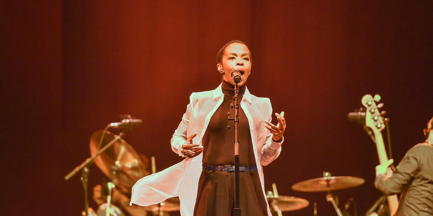 Ms. Lauryn Hill performs with band for the Bryce Jordan Center audience in 2014.