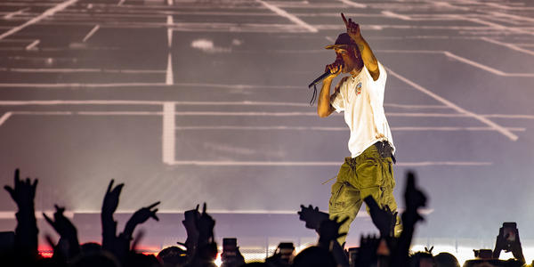 Travis Scott performs on stage to a sold out crowd at Bryce Jordan Center on February 26, 2019