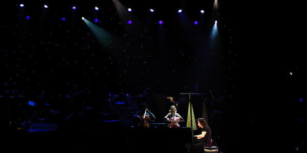 Yanni playing piano during his concert at the BJC in 2011.