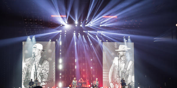 Florida Georgia Line sings to a crowd during their Dig Your Roots tour at the BJC in 2017