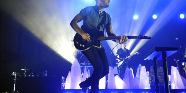 Foster the People perform on stage for the audience at the Bryce Jordan Center in 2014.